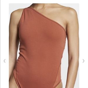 Nike yoga one shoulder bodysuit in rust